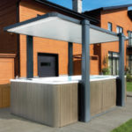 The Covana Legend swim spa cover easily raises and tilts to provide shade and protection from weather.